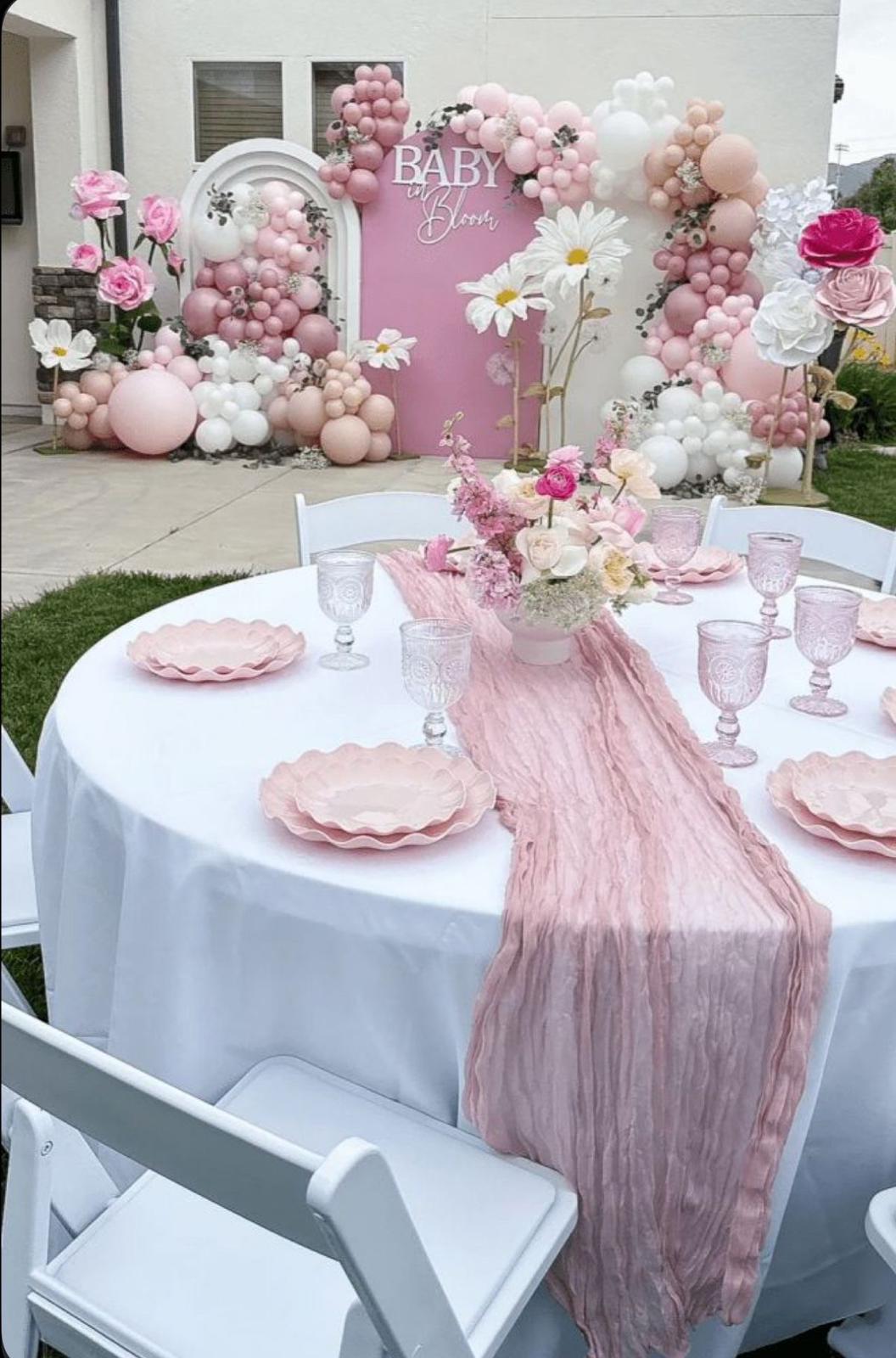 Backdrop, balloon arch, table styling & props